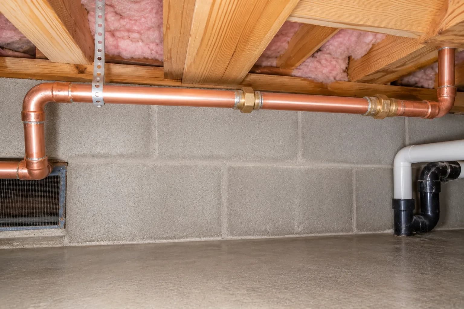 New copper pipe installed after repair in an Alpharetta, GA crawl space